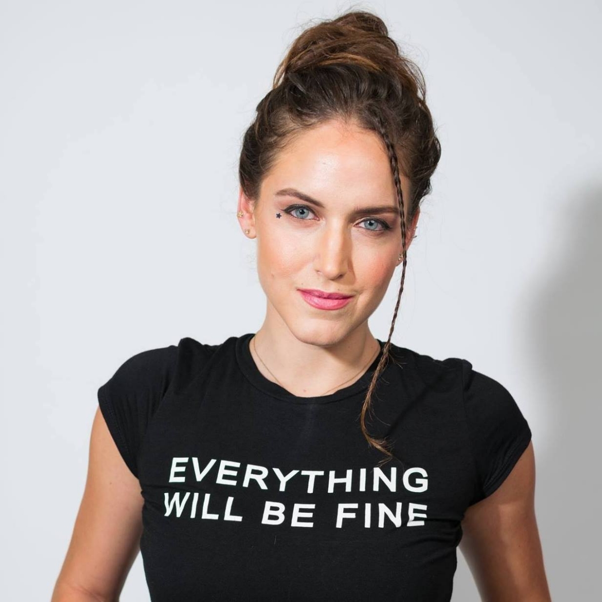headshot Sophie LaBelle wearing black t-shirt that reads 